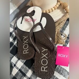 Roxy Brown Embossed Floral Flip Flops